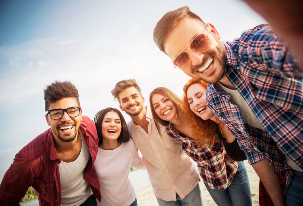 People hugging and smiling after booking international moving services