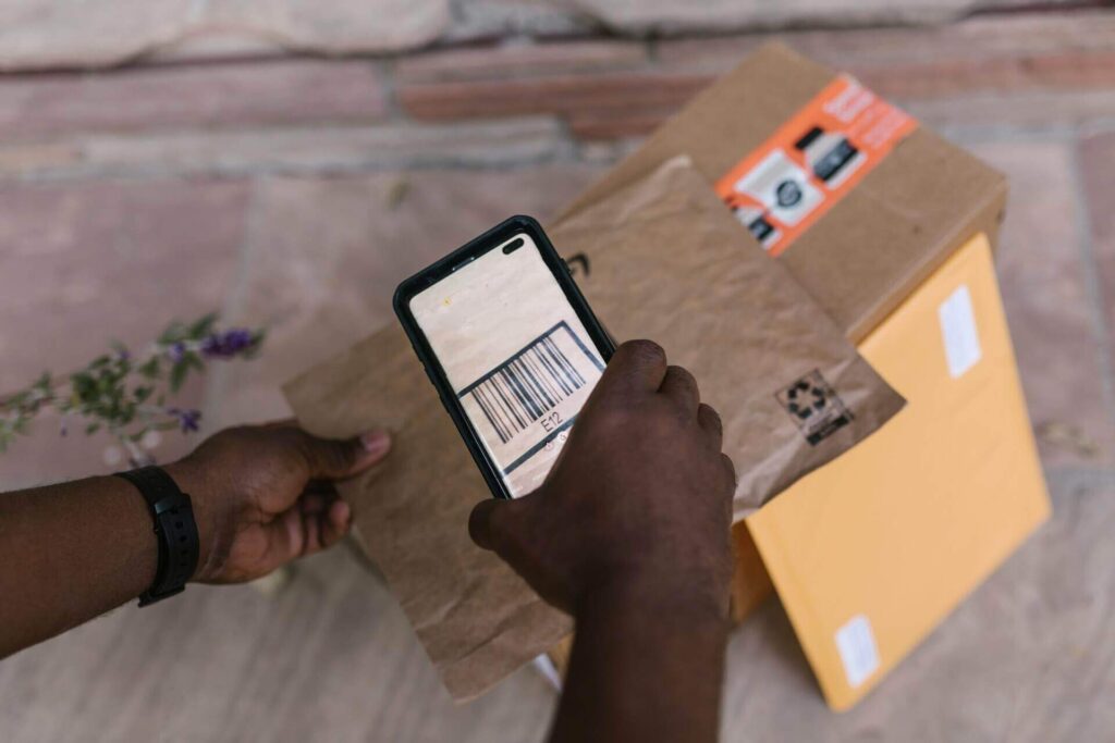 A man holding a barcode reader