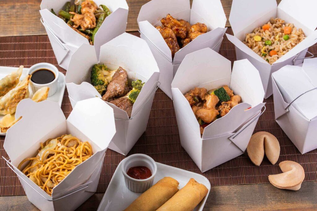A bunch of takeout boxes